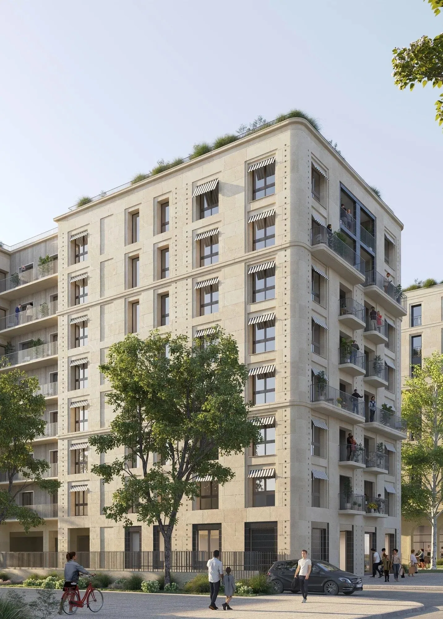 Immeuble d'angle du Septième Art derrière les arbres